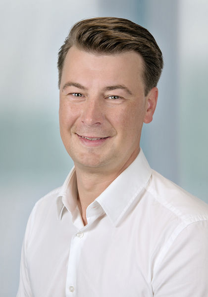 Das Foto zeigt ein Portrait von Jürgen Winder. Er ist der Geschäftsführer der Meusburger Immobilien GmbH.